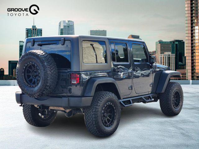 used 2016 Jeep Wrangler Unlimited car, priced at $19,891