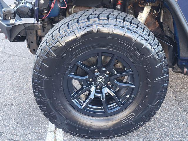 used 2013 Jeep Wrangler Unlimited car, priced at $17,991