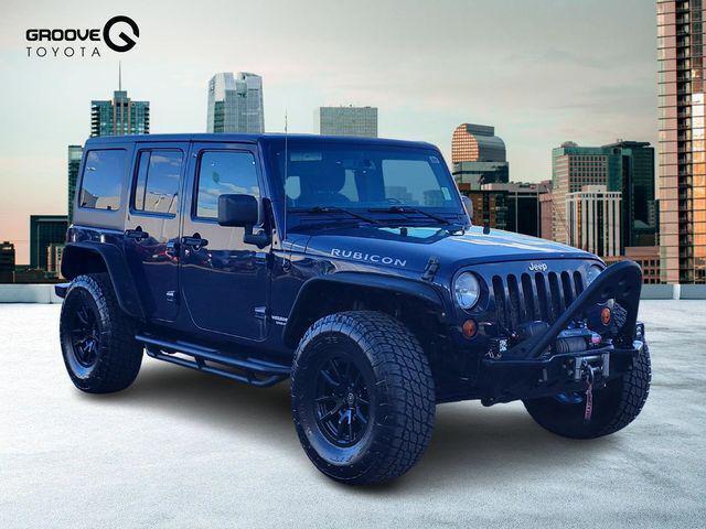 used 2013 Jeep Wrangler Unlimited car, priced at $17,991