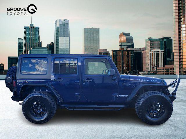used 2013 Jeep Wrangler Unlimited car, priced at $17,991