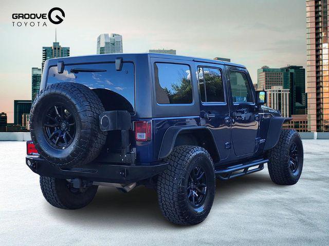 used 2013 Jeep Wrangler Unlimited car, priced at $17,991