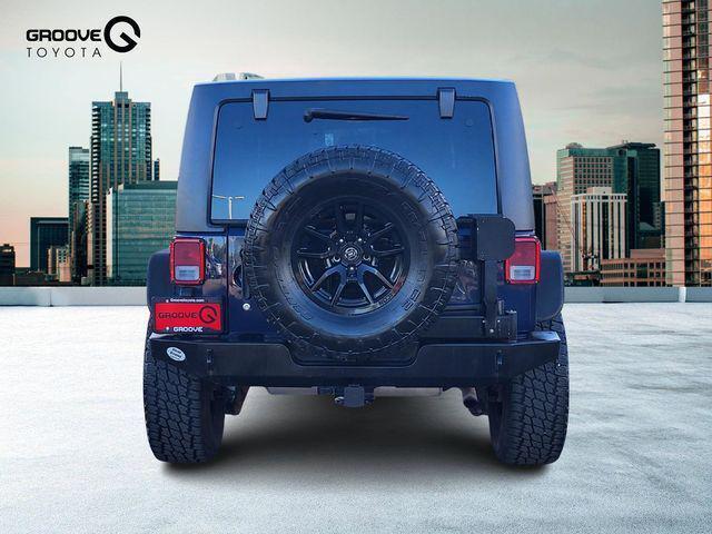 used 2013 Jeep Wrangler Unlimited car, priced at $17,991