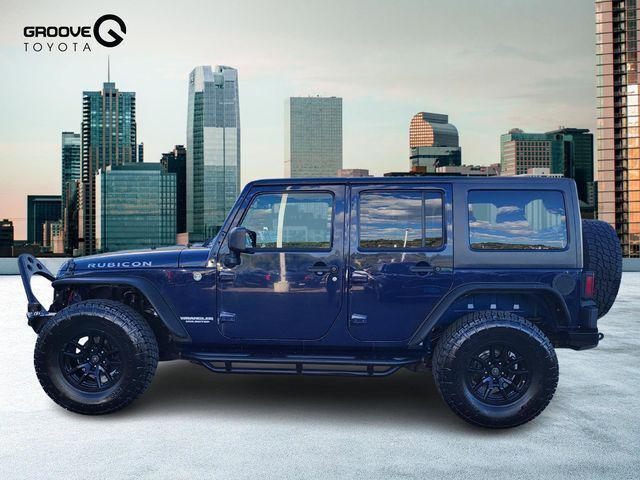 used 2013 Jeep Wrangler Unlimited car, priced at $17,991