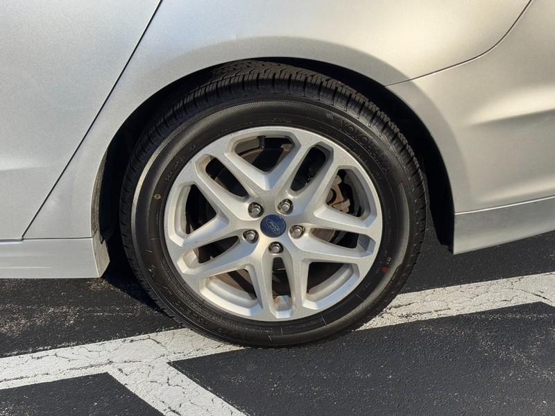 used 2016 Ford Fusion car, priced at $7,490