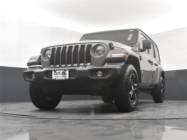 used 2021 Jeep Wrangler Unlimited car, priced at $27,944