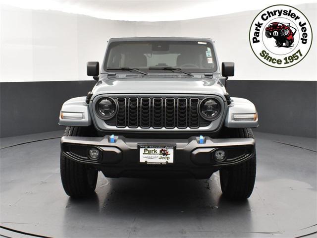 used 2024 Jeep Wrangler 4xe car, priced at $38,328