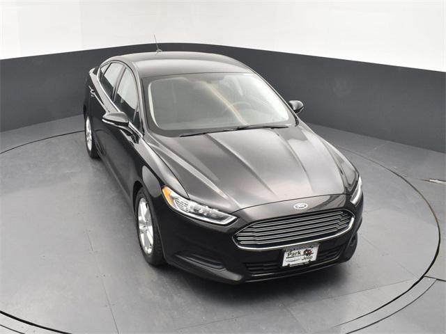 used 2015 Ford Fusion car, priced at $10,597