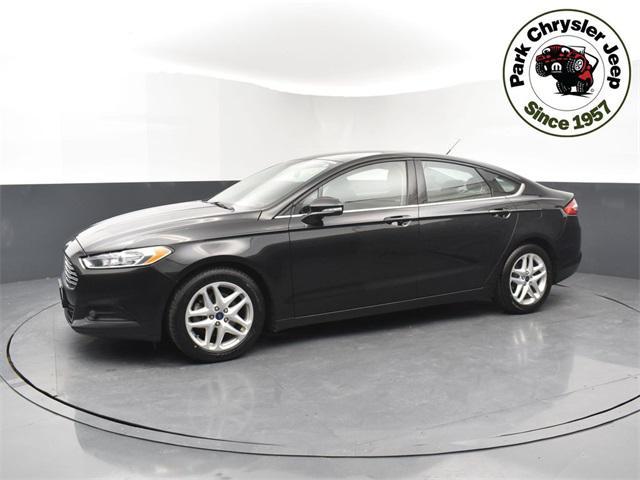 used 2015 Ford Fusion car, priced at $10,597