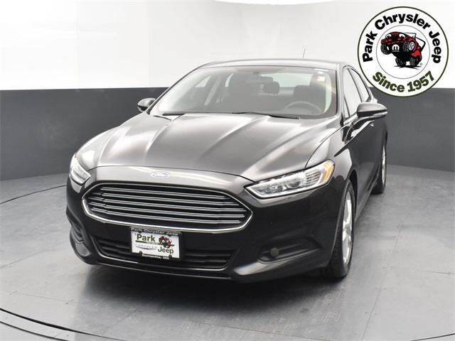 used 2015 Ford Fusion car, priced at $10,597