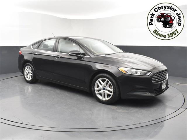 used 2015 Ford Fusion car, priced at $10,597