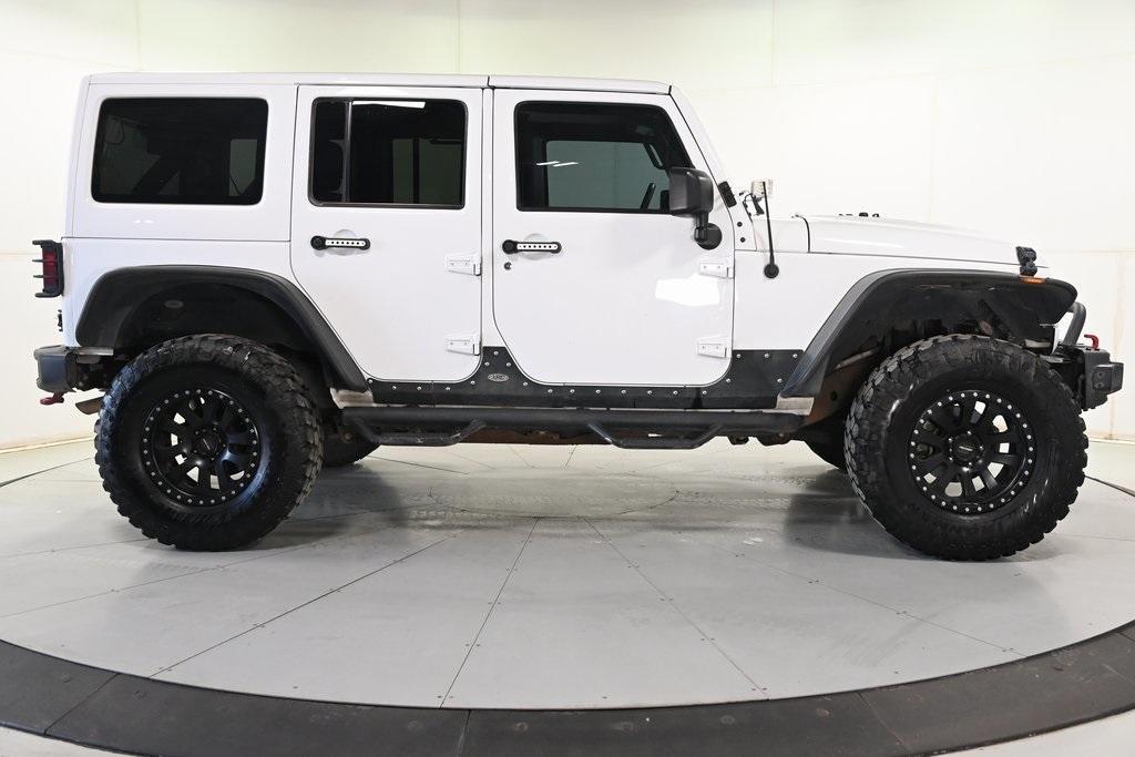 used 2018 Jeep Wrangler JK Unlimited car, priced at $24,358