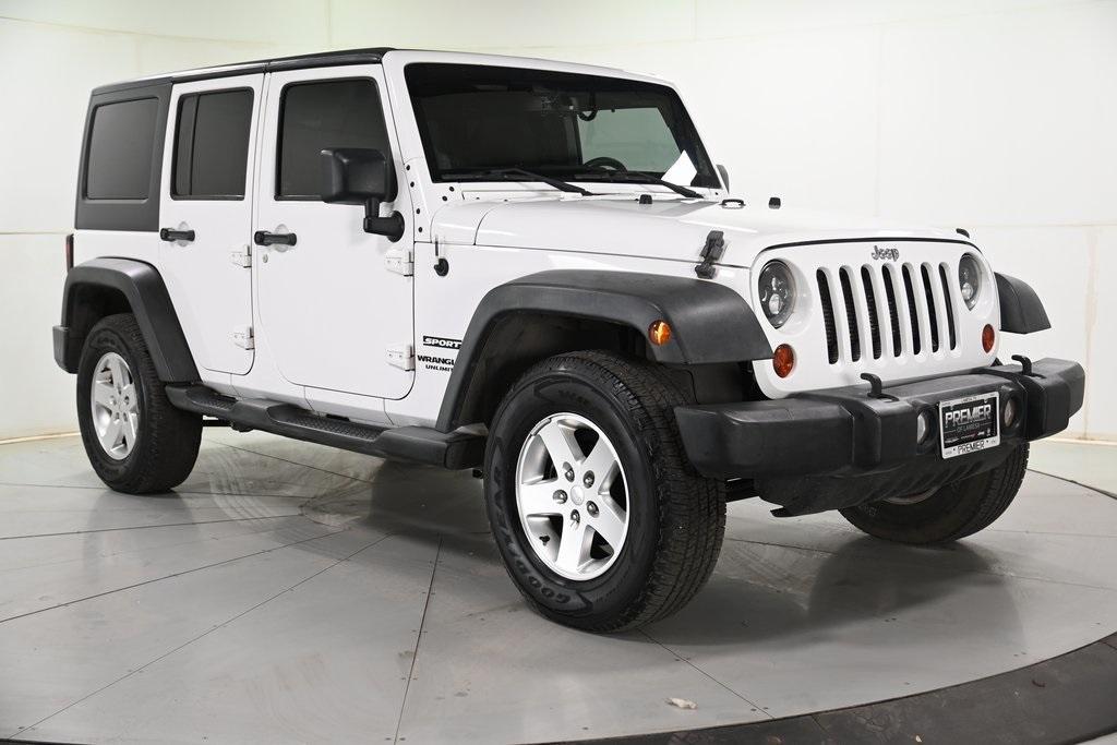 used 2013 Jeep Wrangler Unlimited car, priced at $17,499