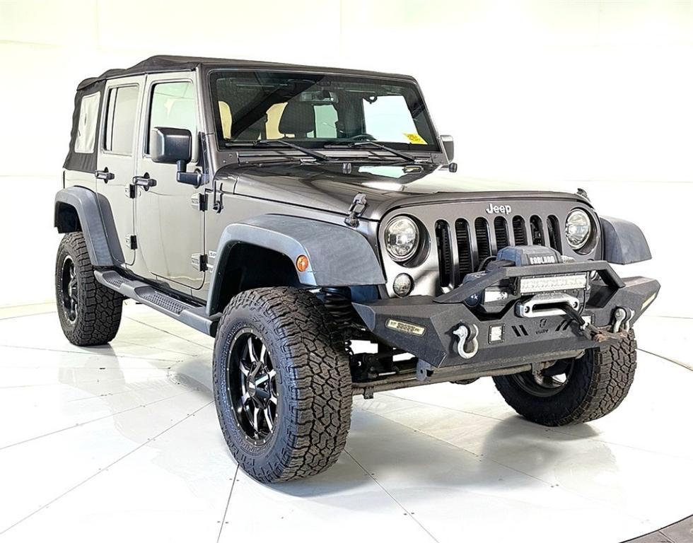 used 2018 Jeep Wrangler JK Unlimited car, priced at $23,041