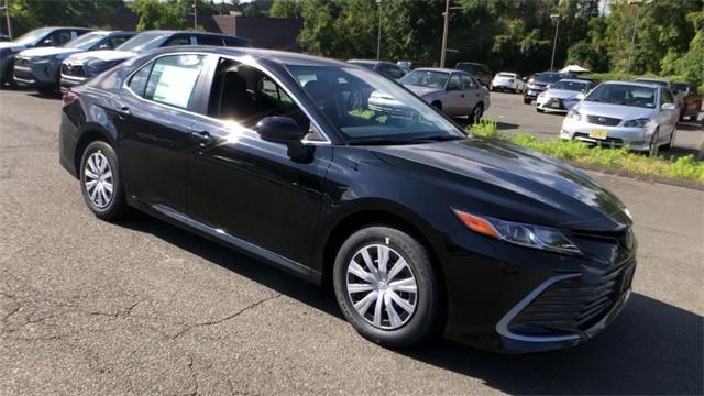 new 2024 Toyota Camry Hybrid car, priced at $30,554