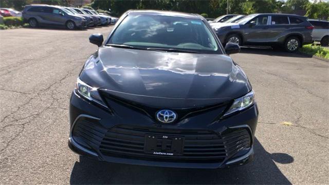 new 2024 Toyota Camry Hybrid car, priced at $30,554