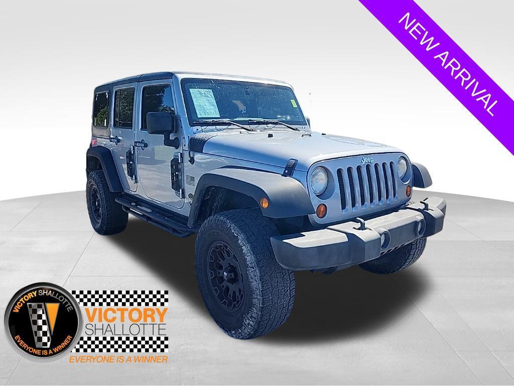 used 2013 Jeep Wrangler Unlimited car, priced at $16,995