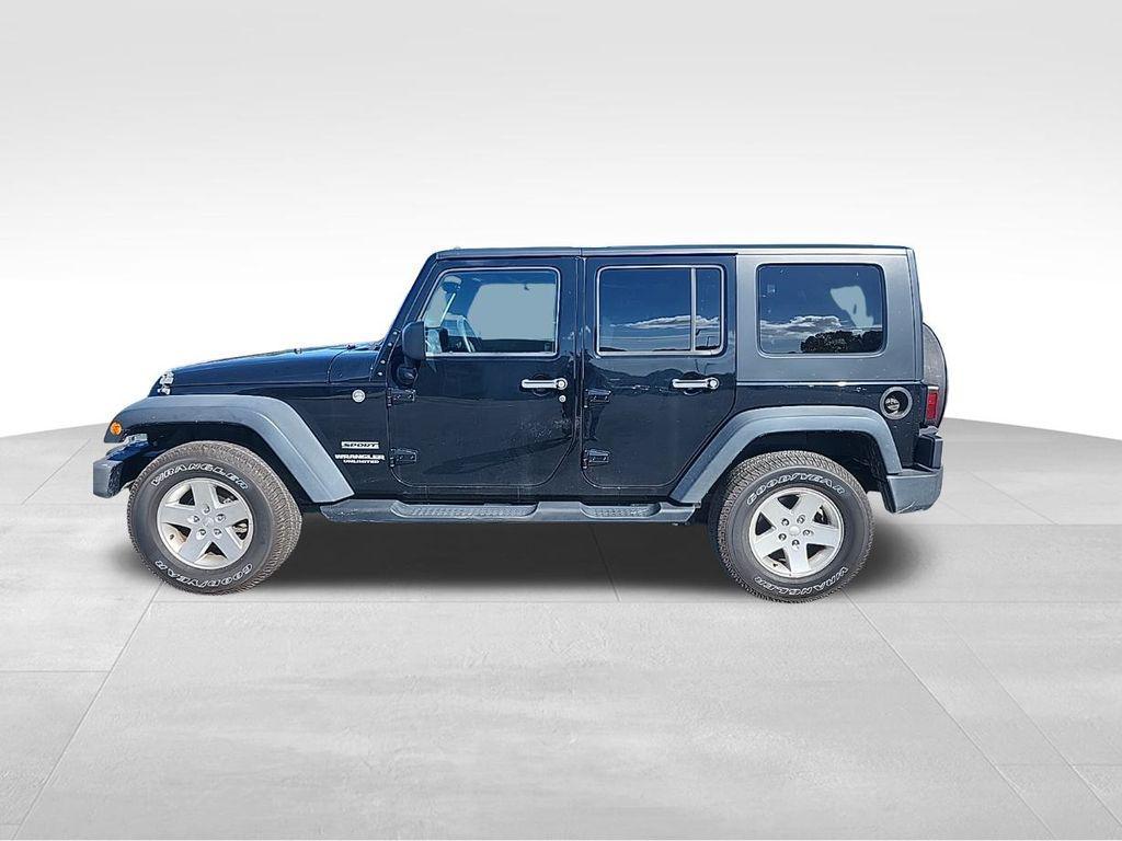 used 2010 Jeep Wrangler Unlimited car, priced at $14,495