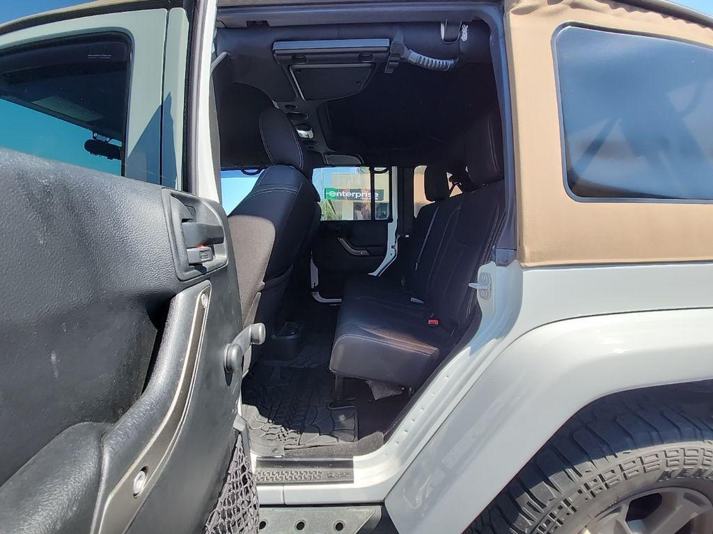 used 2018 Jeep Wrangler JK Unlimited car, priced at $19,395