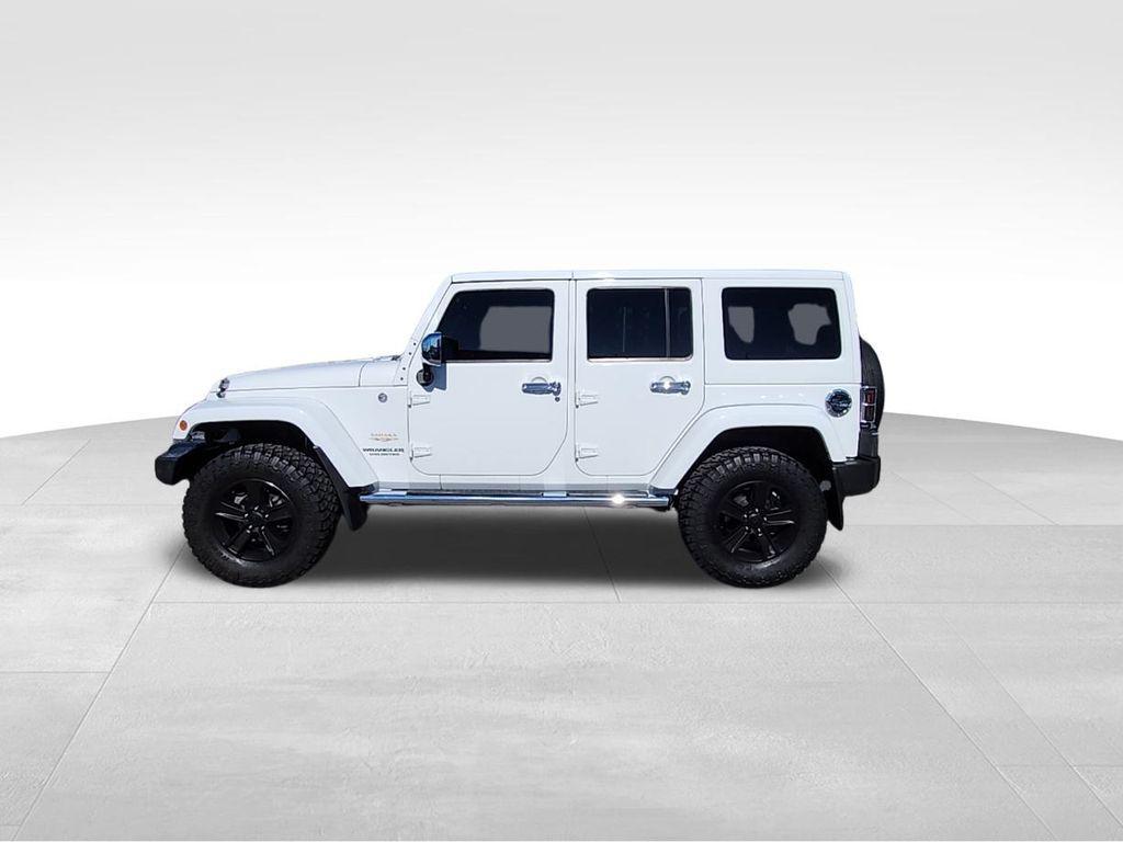 used 2013 Jeep Wrangler Unlimited car, priced at $16,695