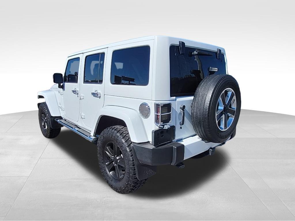 used 2013 Jeep Wrangler Unlimited car, priced at $16,695