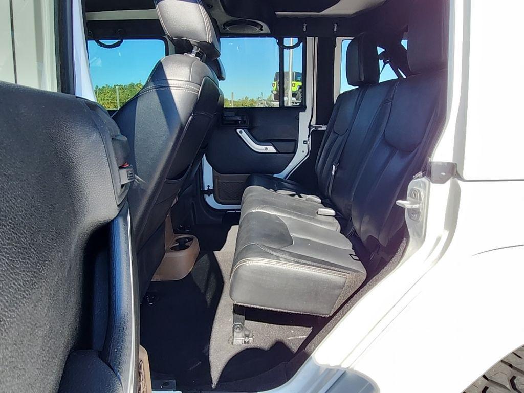 used 2013 Jeep Wrangler Unlimited car, priced at $16,695