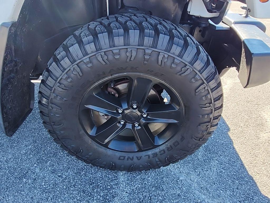 used 2013 Jeep Wrangler Unlimited car, priced at $16,695