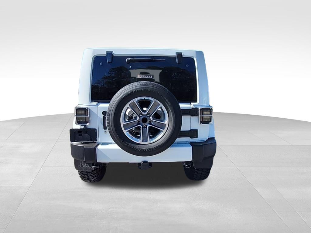 used 2013 Jeep Wrangler Unlimited car, priced at $16,695