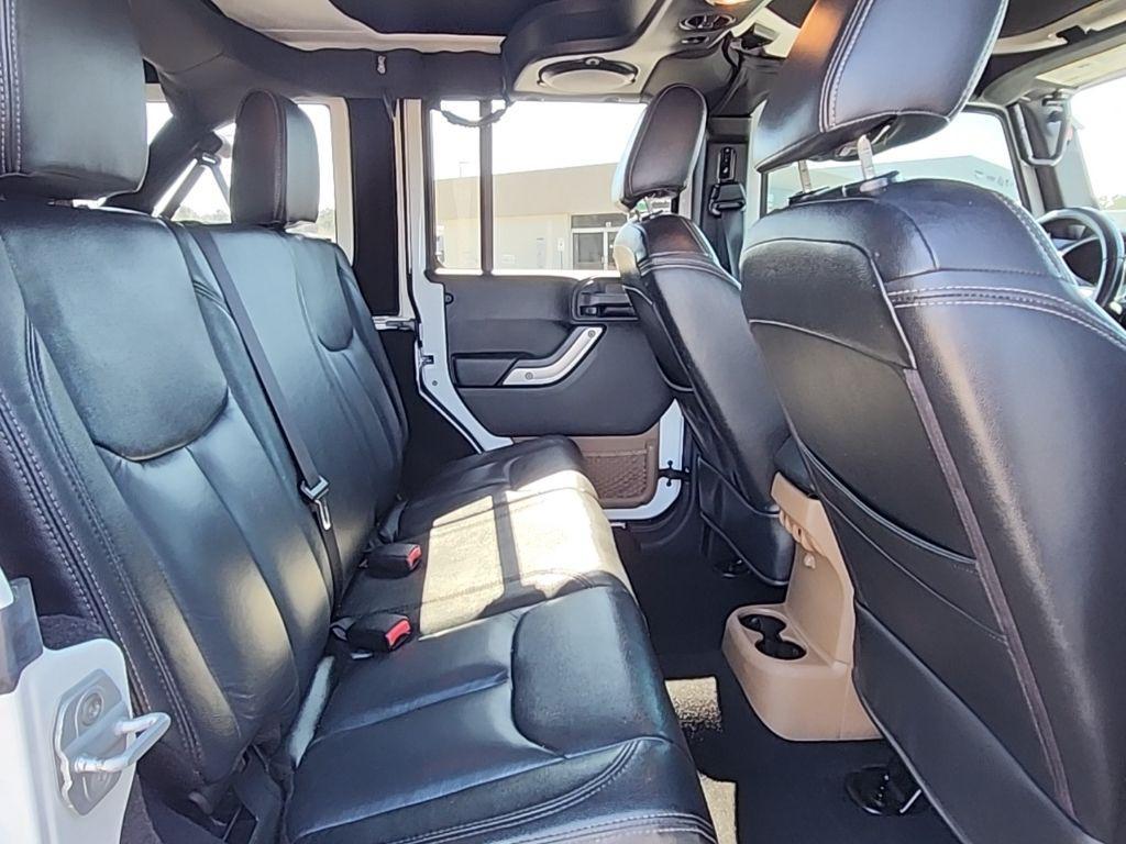 used 2013 Jeep Wrangler Unlimited car, priced at $16,695