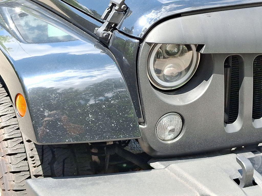 used 2015 Jeep Wrangler Unlimited car, priced at $18,499