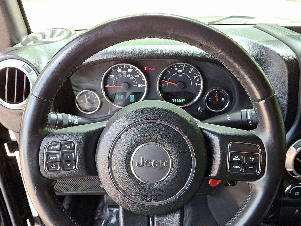 used 2015 Jeep Wrangler Unlimited car, priced at $18,499