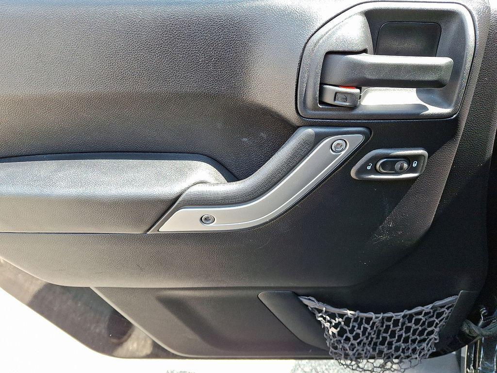 used 2015 Jeep Wrangler Unlimited car, priced at $18,499
