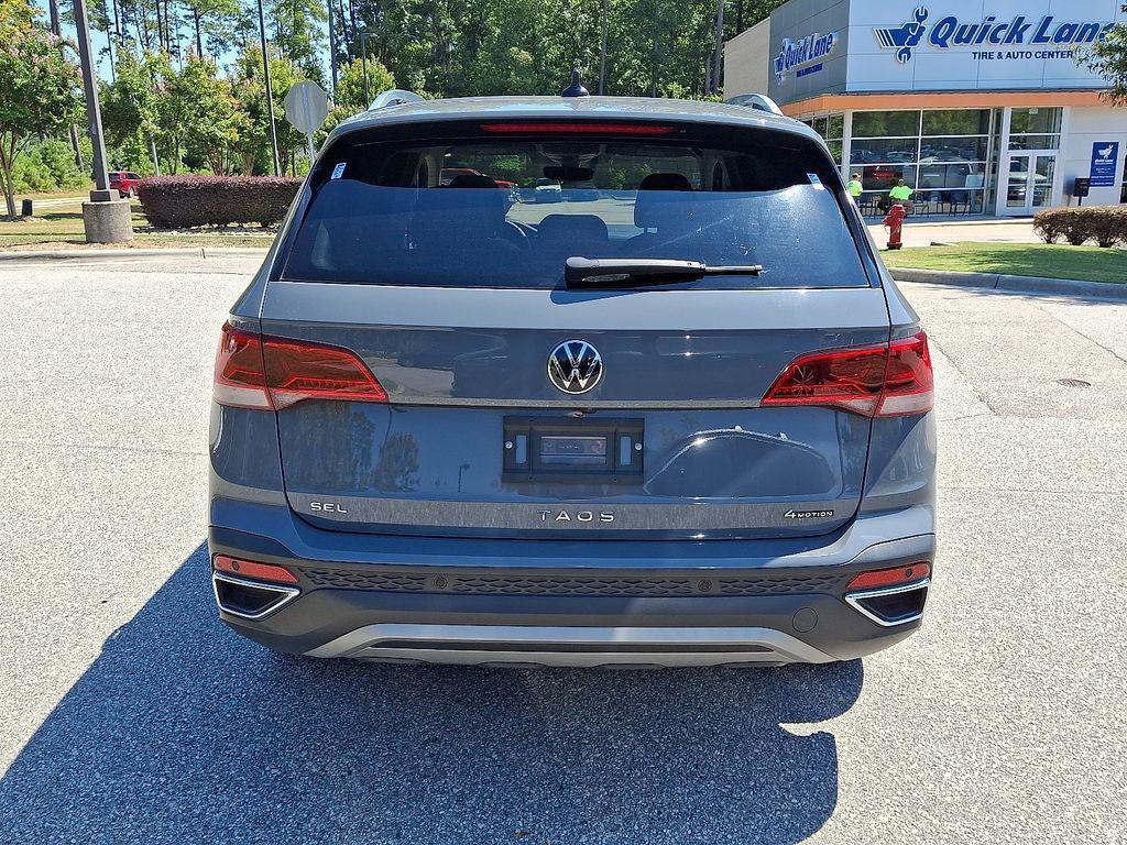 used 2023 Volkswagen Taos car, priced at $24,999