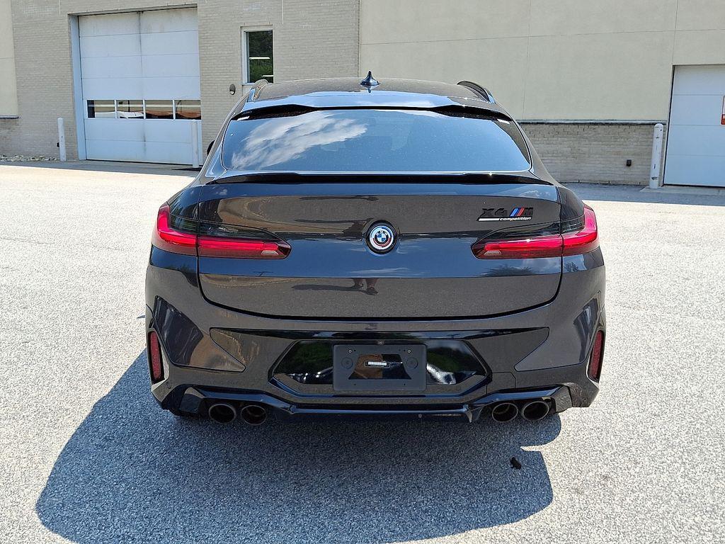 used 2023 BMW X4 M car, priced at $53,478