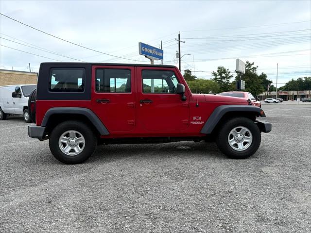 used 2009 Jeep Wrangler Unlimited car, priced at $11,999