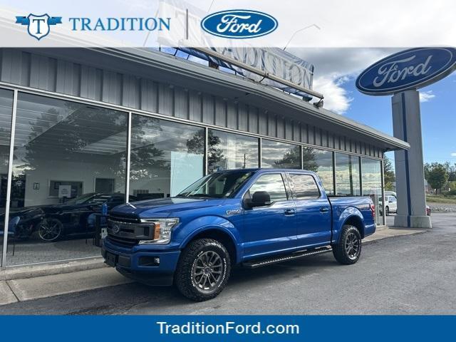 used 2018 Ford F-150 car, priced at $23,623