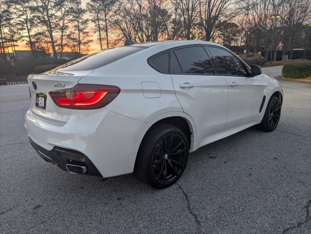 used 2018 BMW X6 car, priced at $23,000