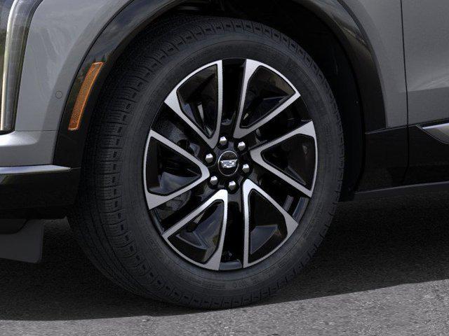 new 2025 Cadillac OPTIQ car, priced at $59,310