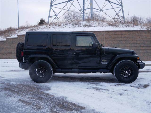 used 2012 Jeep Wrangler Unlimited car, priced at $15,499