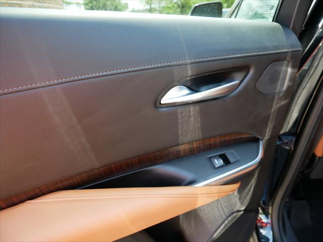 used 2023 Cadillac XT4 car, priced at $32,250