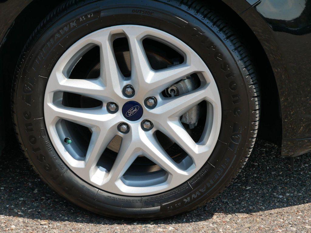 used 2016 Ford Fusion car, priced at $13,499