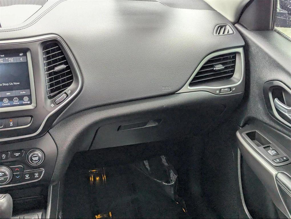 used 2021 Jeep Cherokee car, priced at $17,303