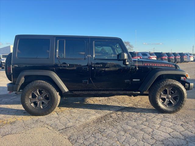 used 2018 Jeep Wrangler JK Unlimited car, priced at $33,477