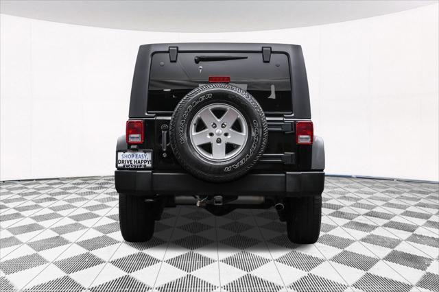 used 2014 Jeep Wrangler Unlimited car, priced at $16,777