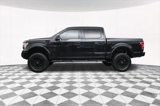 used 2018 Ford F-150 car, priced at $23,877