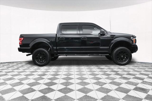 used 2018 Ford F-150 car, priced at $23,877