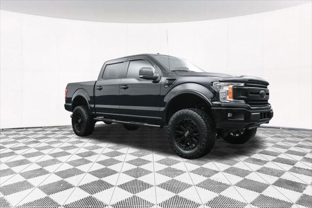 used 2018 Ford F-150 car, priced at $23,877