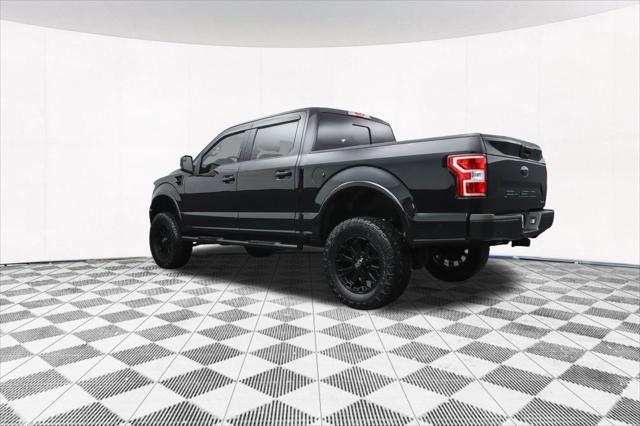 used 2018 Ford F-150 car, priced at $23,877