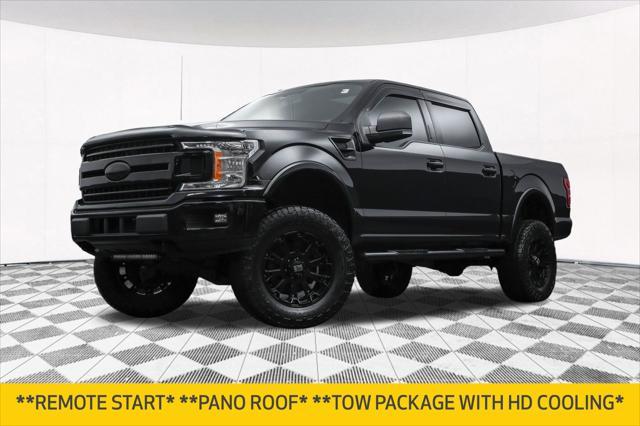 used 2018 Ford F-150 car, priced at $23,877