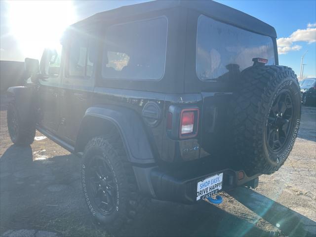 used 2023 Jeep Wrangler 4xe car, priced at $33,277