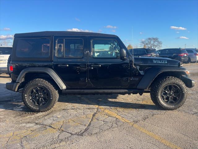 used 2023 Jeep Wrangler 4xe car, priced at $33,277